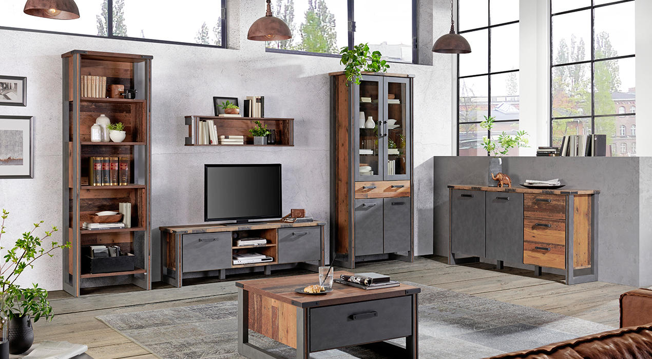 Komplettes Wohnzimmer im Industrial-Stil mit dunklem Holz und hellen Grautönen.