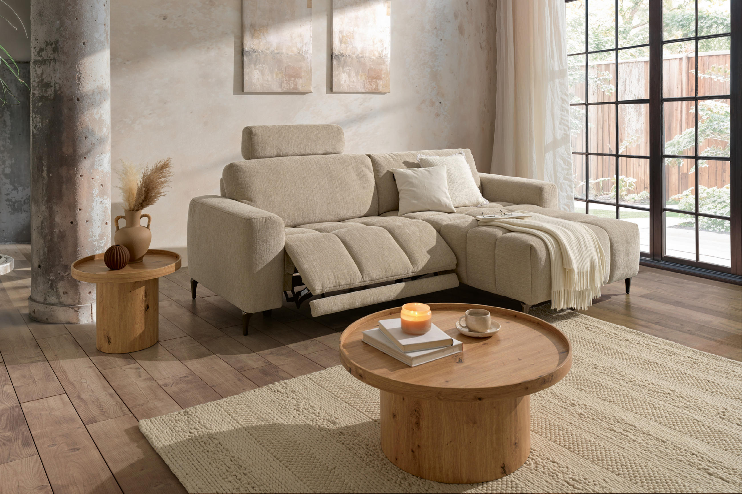 Blaues Sofa mit Relaxfunktion 