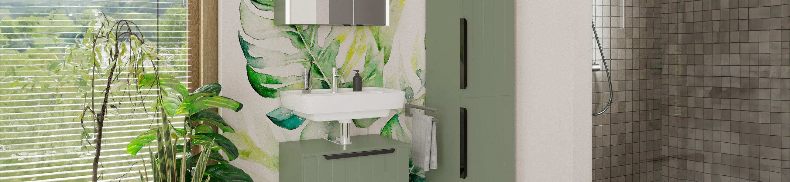 Ein schilfgrünes Badezimmer mit einem Waschbecken.