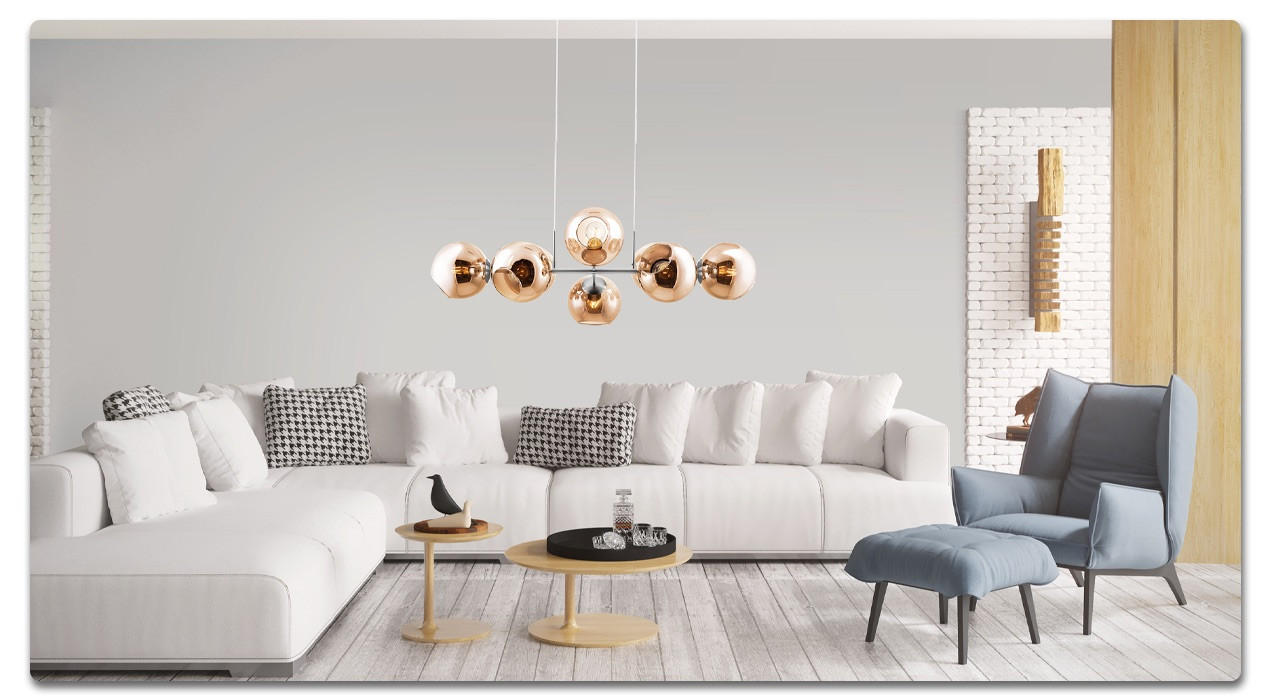 Hängelampe in einem Wohnzimmer mit weißer Couch