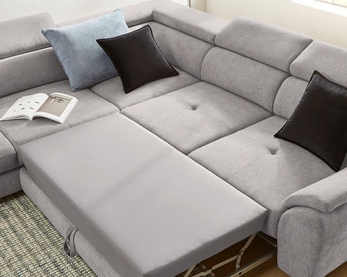 Graues Ecksofa mit Ausziehfunktion
