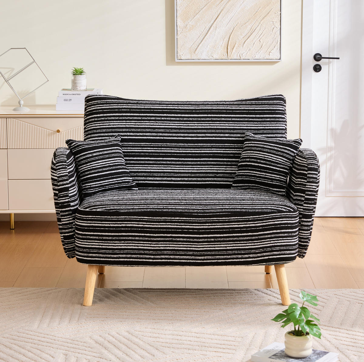 DVOUMÍSTNÁ pohovka ze smyčkové tkaniny 121x81,5x87 cm černá s bočními kapsami a pohodlným sedákem - černá, textil (81.5/87/121cm) - Modfu