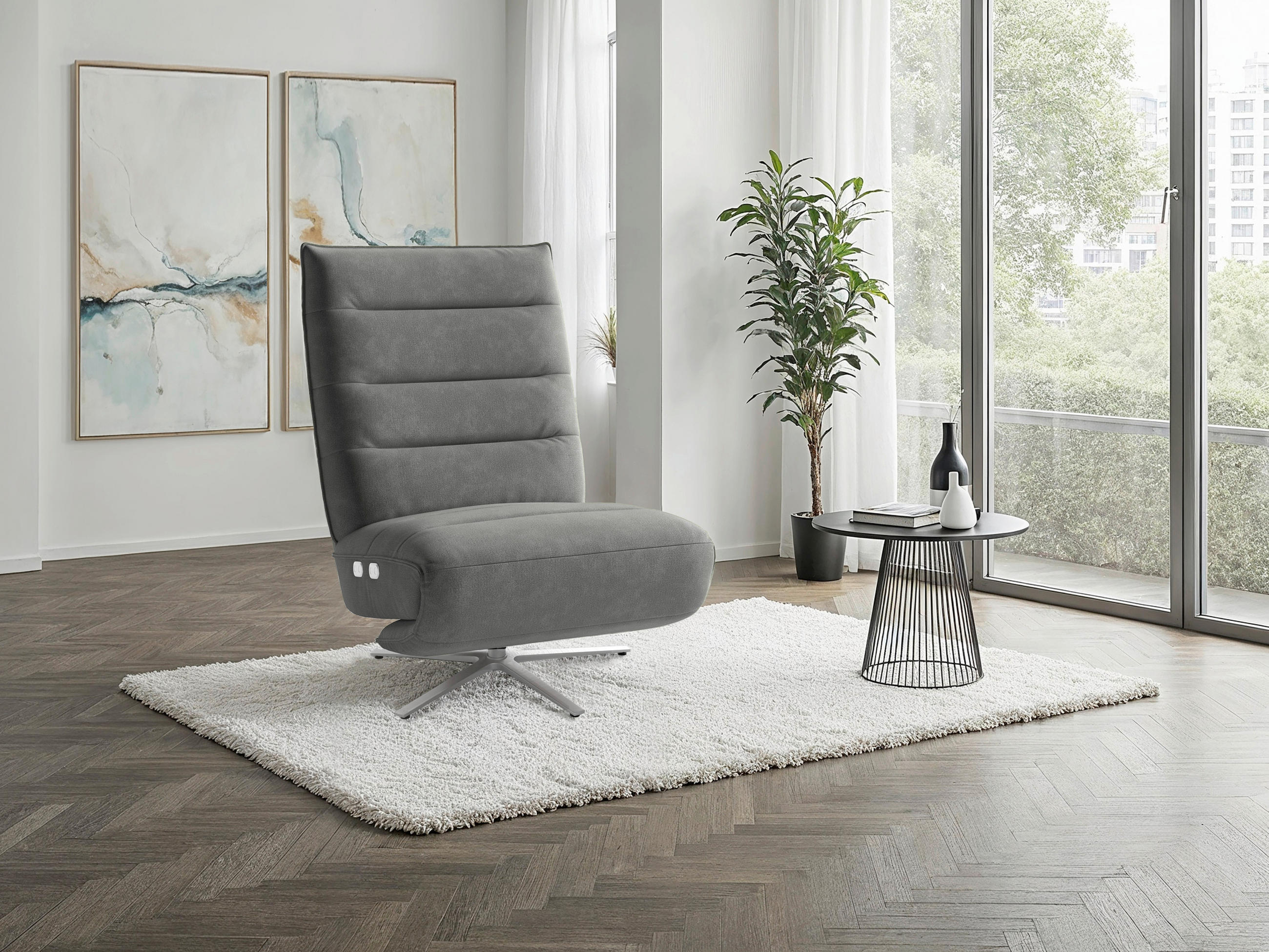 Šedé textilní relaxační křeslo Sit & More