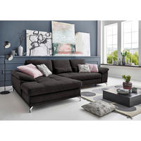 Sit & More ECKSOFA Schwarz Flachgewebe, links davon: Bild, Kissen, rechts davon: Couchtisch, Lektüre in hellem Wohnzimmer.