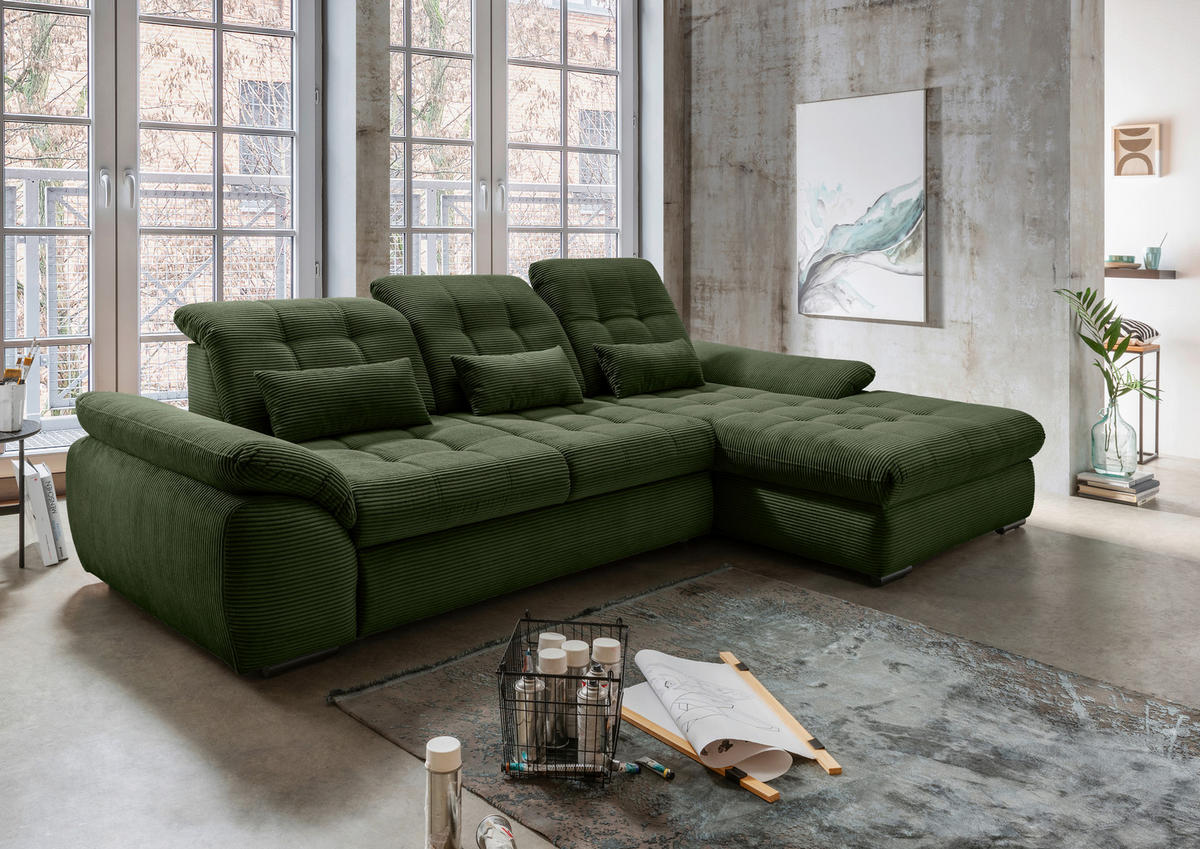 Livetastic ECKSOFA Dunkelgrün Cord, rechts davon: Hochflorteppich, Bild, Topfpflanze in grün, Lektüre in hellem Wohnzimmer.