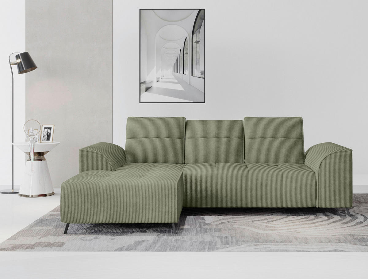 Carryhome ECKSOFA Olivgrün Cord, links davon: Stehleuchte in weiß, Bild in hellem Wohnzimmer.